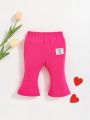 SHEIN Newborn Baby Girl Decorative Patch Side Slit Bootcut Trousers