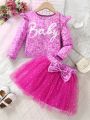 SHEIN Kids CHARMNG 2pcs/set Toddler Girls' Fancy Round Neck Long Sleeve Shimmering Letter Print T-shirt And Sparkly Mesh Skirt With 3d Bow Decoration Outfits For Spring And Autumn