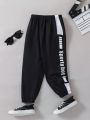 SHEIN Kids EVRYDAY Toddler Boys' Color Block Letter Printed Sweatpants