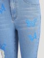 Teen Girls Butterfly Print Distressed Stretch Denim Flare Pants