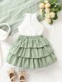 SHEIN Kids CHARMNG Toddler Girls Eyelet Embroidery Halter Top & Bow Front Layer Hem Skirt