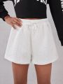 SHEIN Kids Cooltwn Girls' Street Trendy Sports Knitted Solid Color Loose Shorts