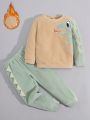 SHEIN Kids QTFun Toddler Boys' Cute And Comfortable Dinosaur Applique Embroidery Design Sweatshirt With Round Neck And Long Pants Set