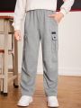 SHEIN Kids EVRYDAY Tween Boy Letter Patched Detail Flap Pocket Side Sweatpants