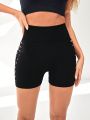 Cut Out Letter Tape Side Wideband Waist Sports Shorts