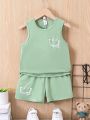 SHEIN Kids EVRYDAY Young Boy's Expression Pattern Printed Round Neck Vest And Shorts 2 Piece Set Casual Style For Summer