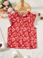 SHEIN Kids SUNSHNE Tween Girls' Elegant Heart Pattern Printed Valentine's Day Short Flare Sleeve Blouse