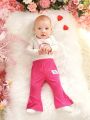 SHEIN Newborn Baby Girl Decorative Patch Side Slit Bootcut Trousers