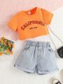 SHEIN Kids EVRYDAY Toddler Girls Letter Graphic Tee & Roll Up Hem Denim Shorts