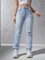 High-waist Ripped Tapered Jeans