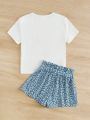 SHEIN Kids SUNSHNE Girls Ditsy Floral & Figure Graphic Tee & Belted Shorts