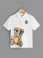 SHEIN Kids QTFun Boys Letter & Cartoon Graphic Polo Shirt