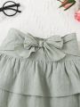 SHEIN X Madison Baby Bow Front Two Layer Hem Skirt