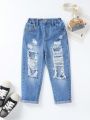 Young Girl Ripped Frayed Cut Out Ripped Frayed Straight Leg Jeans