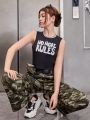 SHEIN Girls' Knitted Letter Printed Vest With Diagonal Pockets & Camouflage Pants & 1pc Waist Bag