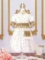 SHEIN Kids Nujoom Little Girls' Gold Foil Print Woven Tape Trim Patchwork Tassel Decoration Dress