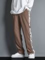 Manfinity Men's Loose Straight Leg Sweatpants With Printed Patchwork