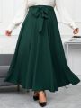 SHEIN Clasi Women'S Plus Size Solid Color High Waist Front Knot Design Long Skirt