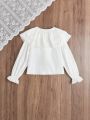 SHEIN Kids FANZEY Girls' Woven Solid Color Loose-fit Elegant Casual Blouse With Ruffle Hem