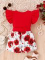 Baby Girl's Ruffle Detailed Top With Twist And Floral Pattern Shorts Set