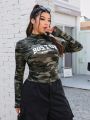 SHEIN Coolane Plus Size Camo & Letter Graphic Mock Neck Crop Tee