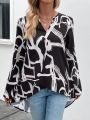 Women's Notched V-neckline Roll-tab Sleeve Printed High Low Hem Casual Shirt