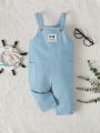 SHEIN Baby Boy Letter Patched Detail Pocket Front Overall Jumpsuit