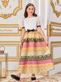 SHEIN Kids Nujoom Slim Fit Cute Vintage Palace Style Puff Sleeve Blouse And Knee-Length Skirt Set