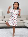 SHEIN Toddler Girls' Casual Knitted Love Heart Print Loose Fit Short Sleeve Round Neck Sleep Dress