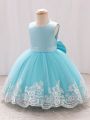 Young Girl's Sleeveless Embroidered Mesh Formal Dress With Large Bow Detail On Back