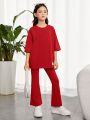 SHEIN Kids EVRYDAY Tween Girls' Casual Comfortable Slogan Printed Round Neck T-Shirt And Flare Pants Set