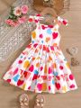 SHEIN Kids SUNSHNE Toddler Girls Heart Print Bow Shoulder Ruffle Hem Cami Dress