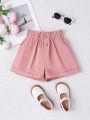 SHEIN Kids EVRYDAY Big Girls' Woven Solid Color Loose Fit Casual Shorts With Dual Pockets For Spring/summer