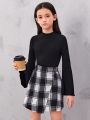 SHEIN Kids FANZEY Tween Girls' Knitted Solid Color Stand Collar Top And Knitted Plaid Skirt Set