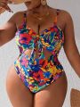 SHEIN Swim Vcay Plus Size Hollow Out Lace-Up One-Piece Swimsuit With Floral Print