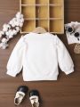 Baby Girls' Comfortable And Loose Sweater With Simple Heart Shaped Printing And Comfortable Wide Hem In Spring And Autumn