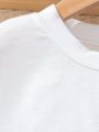 SHEIN Kids EVRYDAY Tween Girls' Letter Cartoon Printed Short Sleeve T-Shirt And Shorts Set