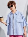 SHEIN Kids KDOMO Tween Boys' Casual Korean Style Vertical Striped Open Front Half-Sleeve Shirt, Loose Fit