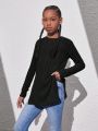 SHEIN Kids Cooltwn Tween Girls' Casual Solid Color Round Neck Long Sleeve Split Side T-Shirt, Warm Winter