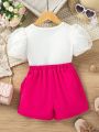 SHEIN Kids Nujoom Little Girl's Short Puff Sleeve Top And Bowknot Decorated Skirted Leggings Two Piece Set