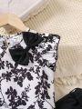 SHEIN Kids FANZEY Toddler Girls' Flounce Hem Short Sleeve Top And Black & White Floral Print Shorts Set