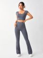 SHEIN Daily&Casual Women'S Backless Crop Top And Bell Bottom Athletic Set