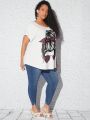 SHEIN CURVE+ Plus Size Figure Printed T-shirt With Curved Hem