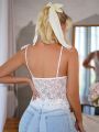 Floral Print Lace Trimmed Sleeveless Camisole Top With Knotted Shoulder Straps