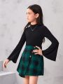 SHEIN Kids FANZEY Girls' Stand Collar Solid Color Blouse & Plaid A-Line Skirt Set With Flare Sleeves