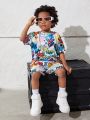 SHEIN Kids HYPEME 2pcs Toddler Boys' Cartoon Game Console & Letter Graffiti Print Short Sleeve T-shirt And Shorts Set