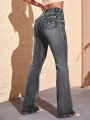 SHEIN Essnce Flared Denim Trousers