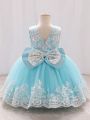 Young Girl's Sleeveless Embroidered Mesh Formal Dress With Large Bow Detail On Back