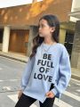 SHEIN Girls' Cute & Cool Knitted Printed Pattern Round Neck Pullover Sweatshirt With Long Sleeves