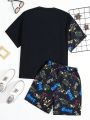 SHEIN Teen Boys' Casual Streetwear Style Night Light Digital Letter Printed Patchwork Short Sleeve T-Shirt And Shorts Set